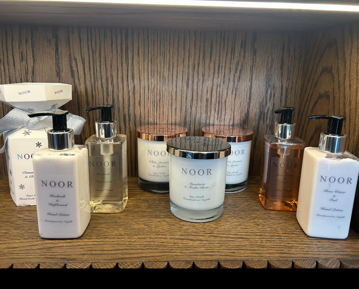 The Noor Brand luxury candles and home fragrance at Steel Serenity